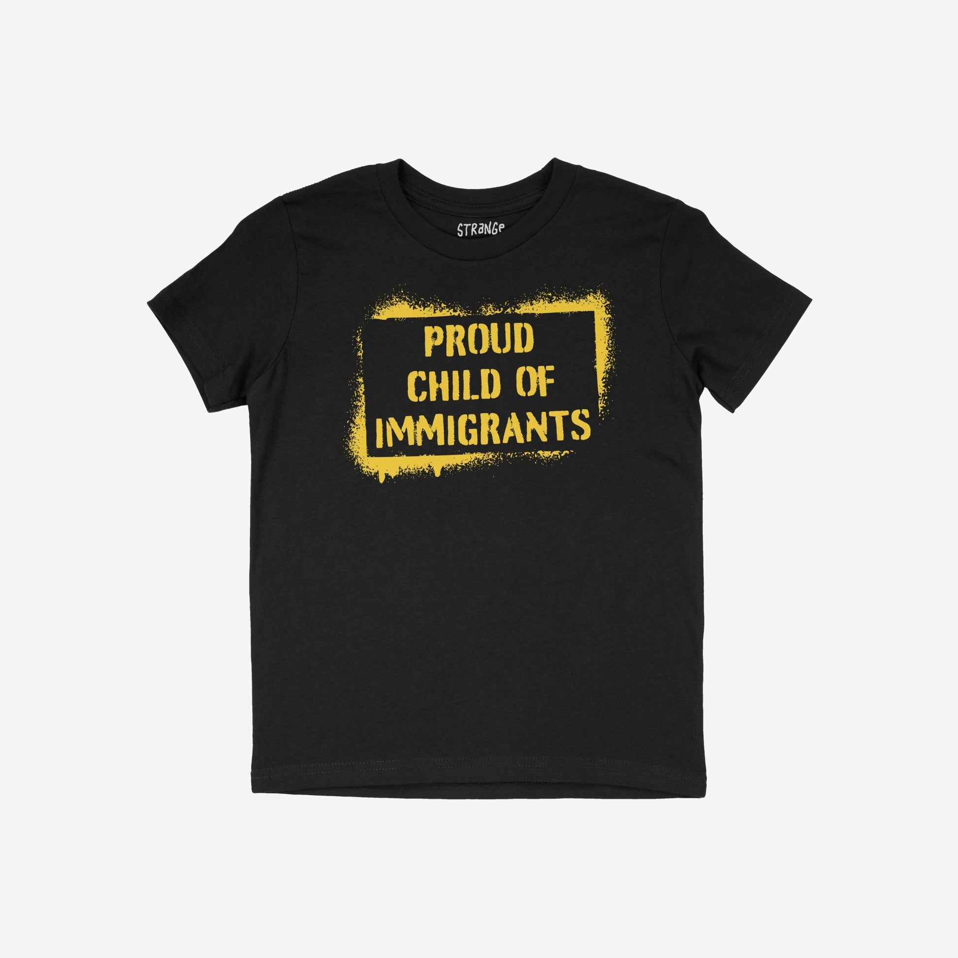 Black T-shirt featuring bold, yellow stencil-style text: PROUD CHILD OF IMMIGRANTS within a painted rectangle, symbolizing defiance and pride in immigrant legacy and resilience.