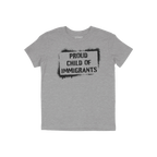 Heather-gray T-shirt with a bold black stencil graphic reading PROUD CHILD OF IMMIGRANTS, symbolizing resilience and defiance