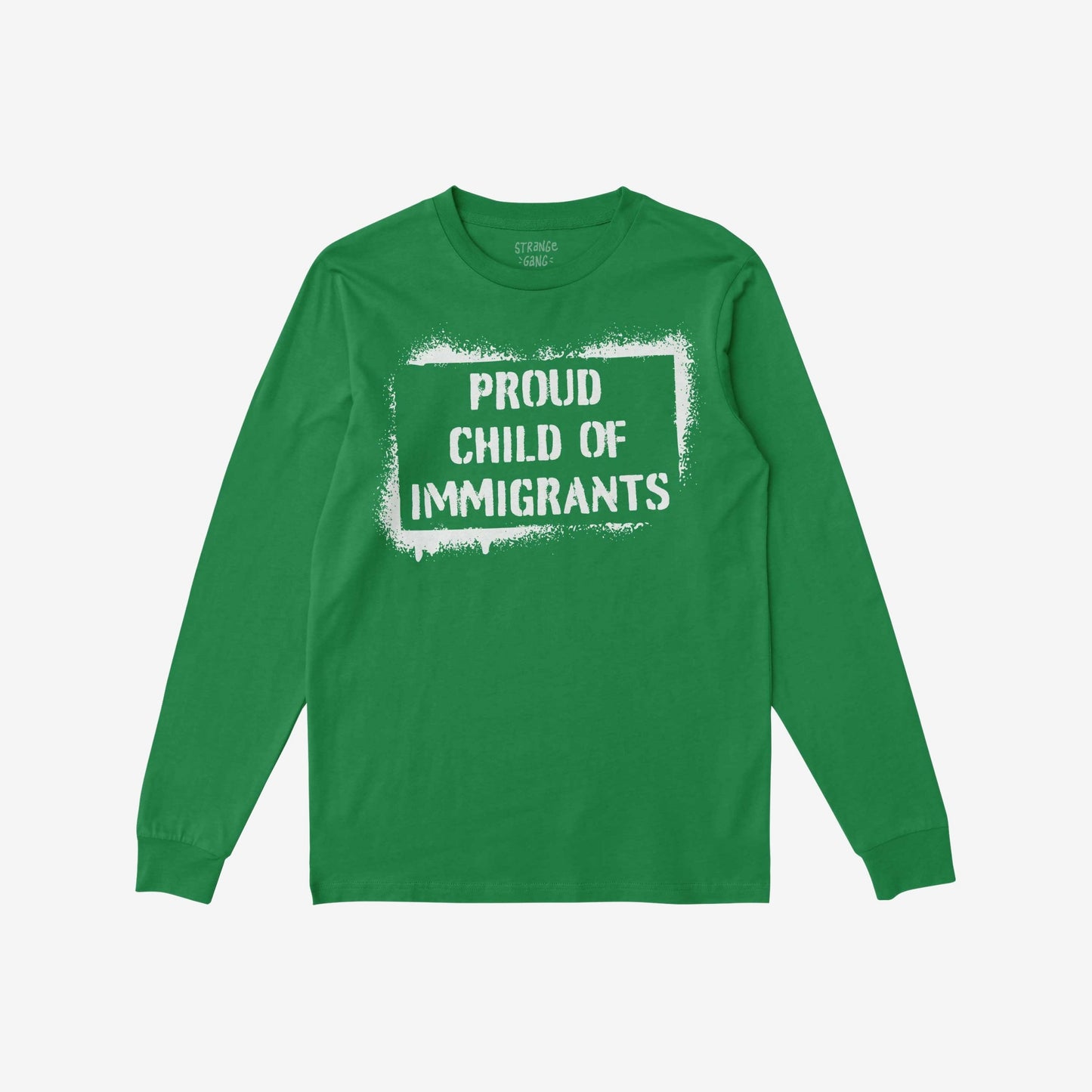 Green long-sleeved T-shirt flat with white stencil graphic stating “PROUD CHILD OF IMMIGRANTS” inside a rough border, embodying cultural pride and belonging.