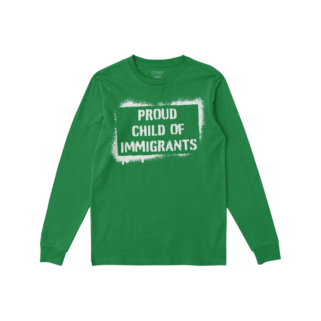 Green long-sleeved T-shirt flat with white stencil graphic stating “PROUD CHILD OF IMMIGRANTS” inside a rough border, emb