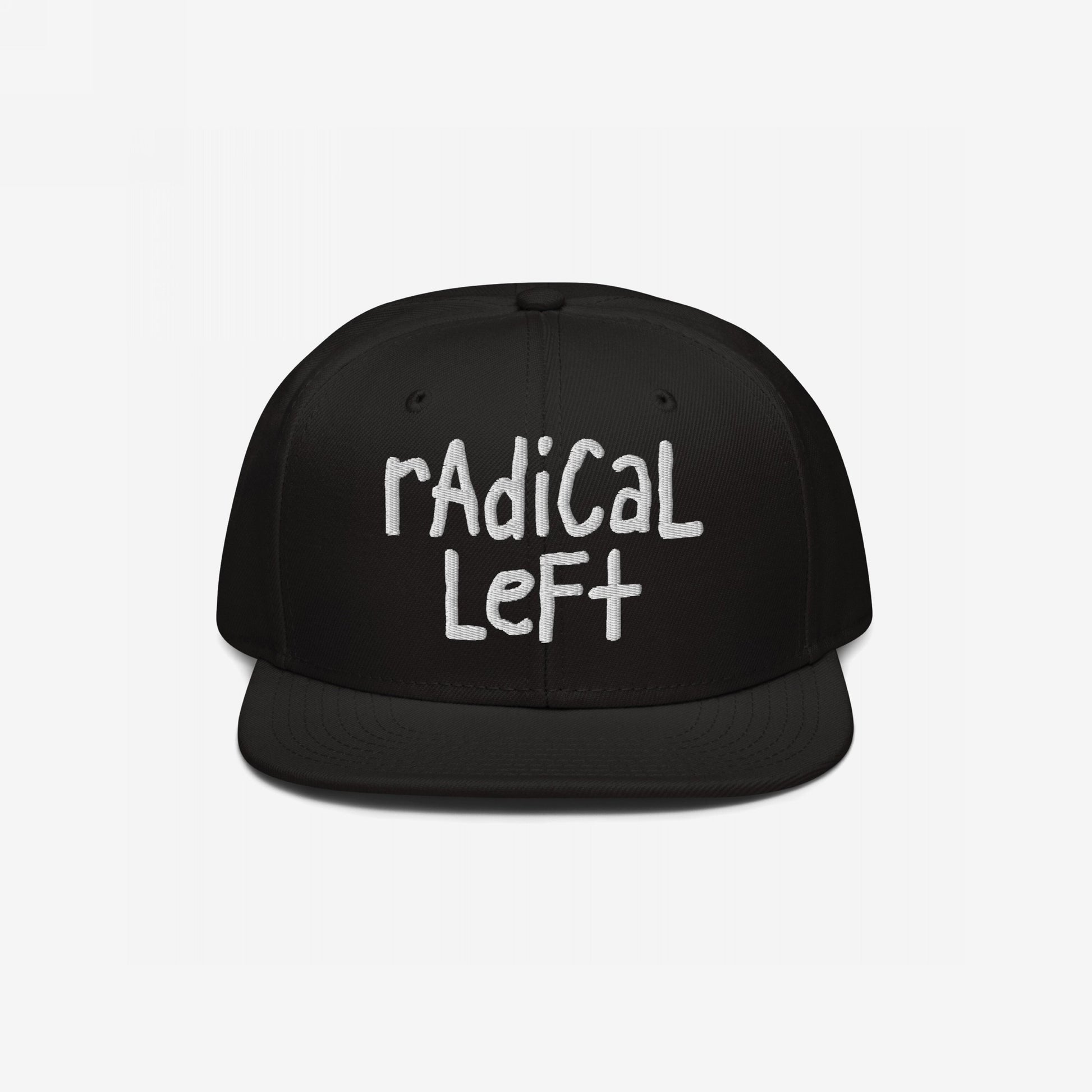 Black snapback cap with white radical left embroidery in a hand-drawn style, embodying a progressive spirit. Quietly comfortable yet bold, reflecting values of equality and resistance against fearmongering.