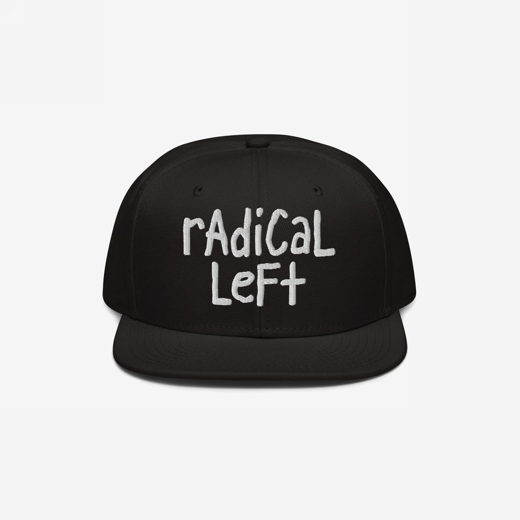 Black snapback cap with radical left in white hand-lettered text. The Radical Left Hat symbolizes progressive values, blending hand-drawn embroidery with a casual style for a bold, justice-aligned statement.