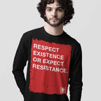 Young man wearing the Respect Existence T-shirt, featuring a bold red rectangle with the empowering message Respect existence or expect resistance, embodying activism and equity.