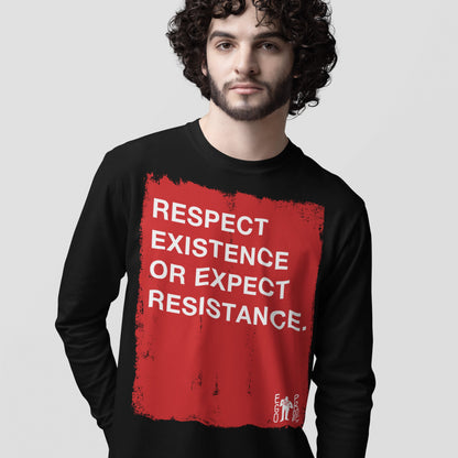 Young man wearing the Respect Existence T-shirt, featuring a bold red rectangle with the empowering message Respect existence or expect resistance, embodying activism and equity.