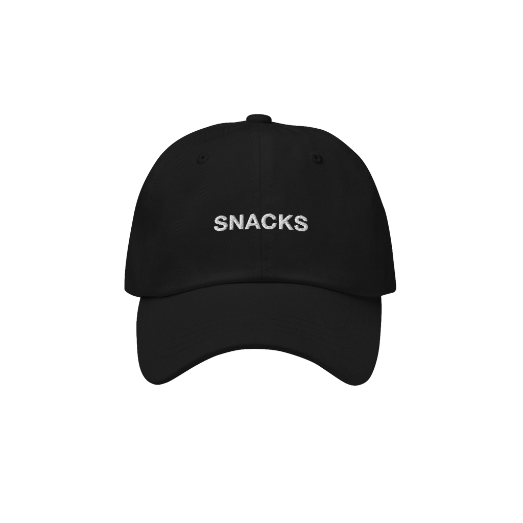 The Snacks Hat is a black dad hat with SNACKS embroidered in white, perfect for snack enthusiasts wanting to make a bold yet 