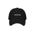 The Snacks Hat is a black dad hat with SNACKS embroidered in white, perfect for snack enthusiasts wanting to make a bold yet 