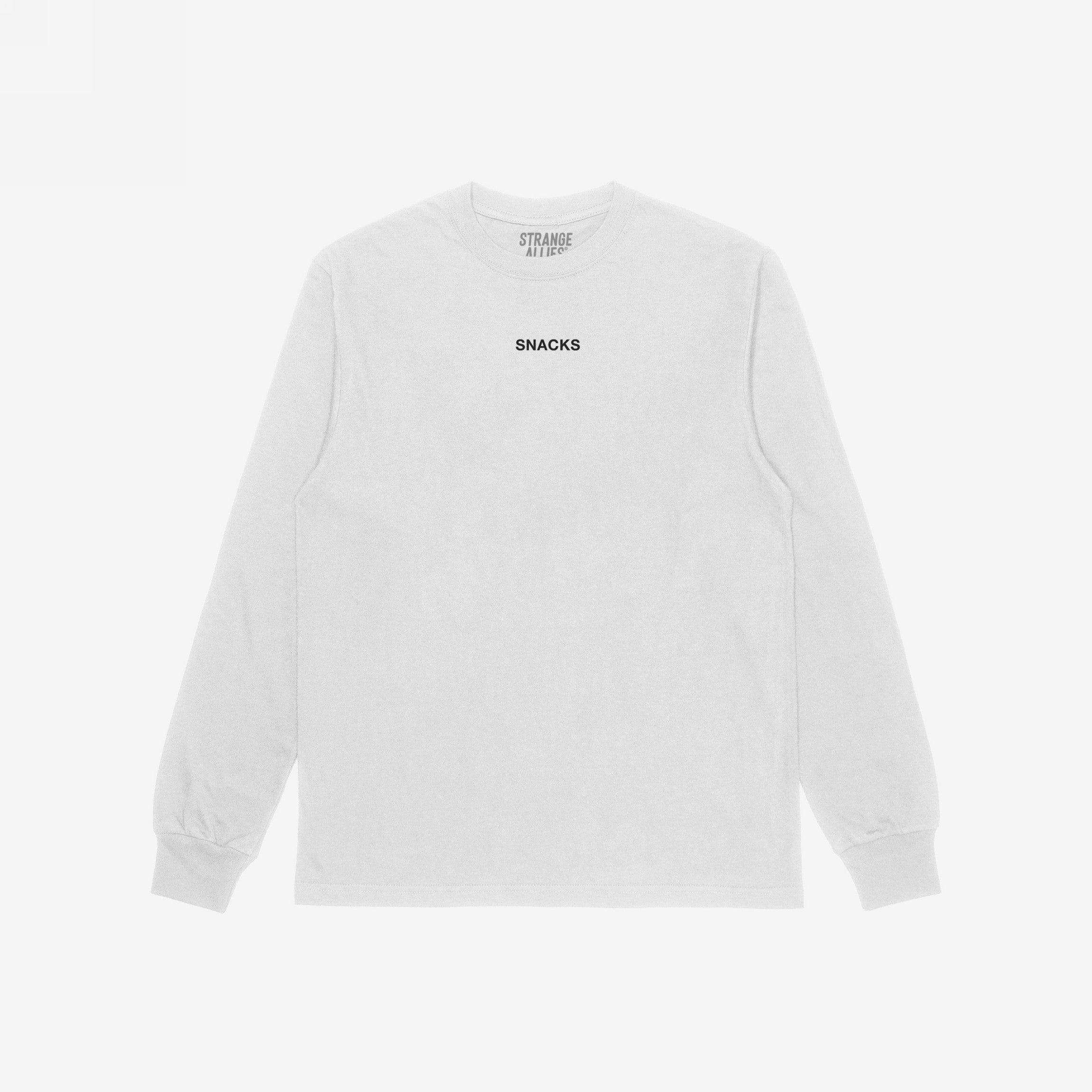 Plain white long-sleeve Snacks T-shirt with “SNACKS” in small black letters on the chest, embodying a playful, cryptic vibe from the brand Strange Allies.