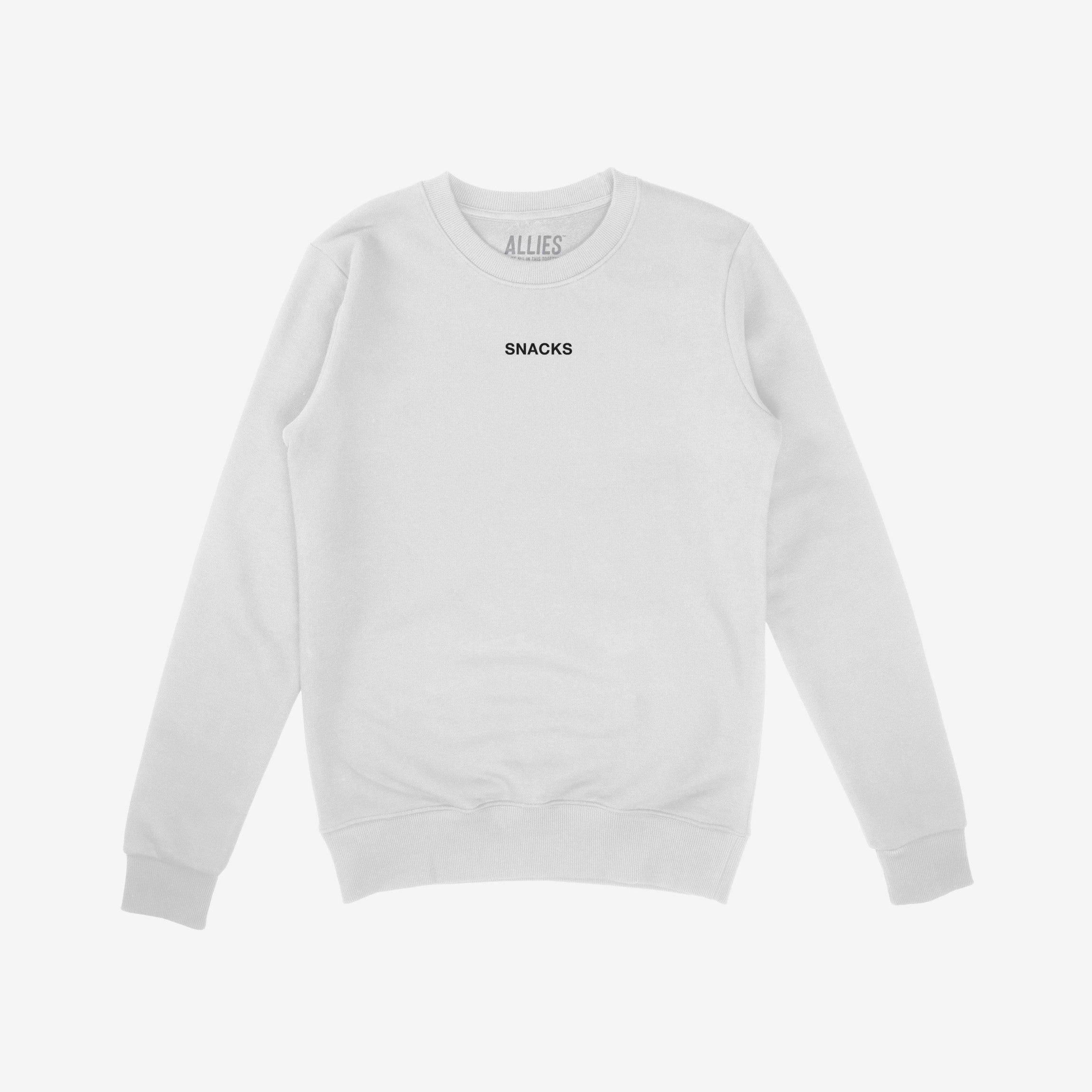 White crewneck sweatshirt featuring SNACKS in small black letters on the chest, embodying a minimal yet impactful style. Part of the Snacks Hoodie & Sweatshirt collection by ALLIES.