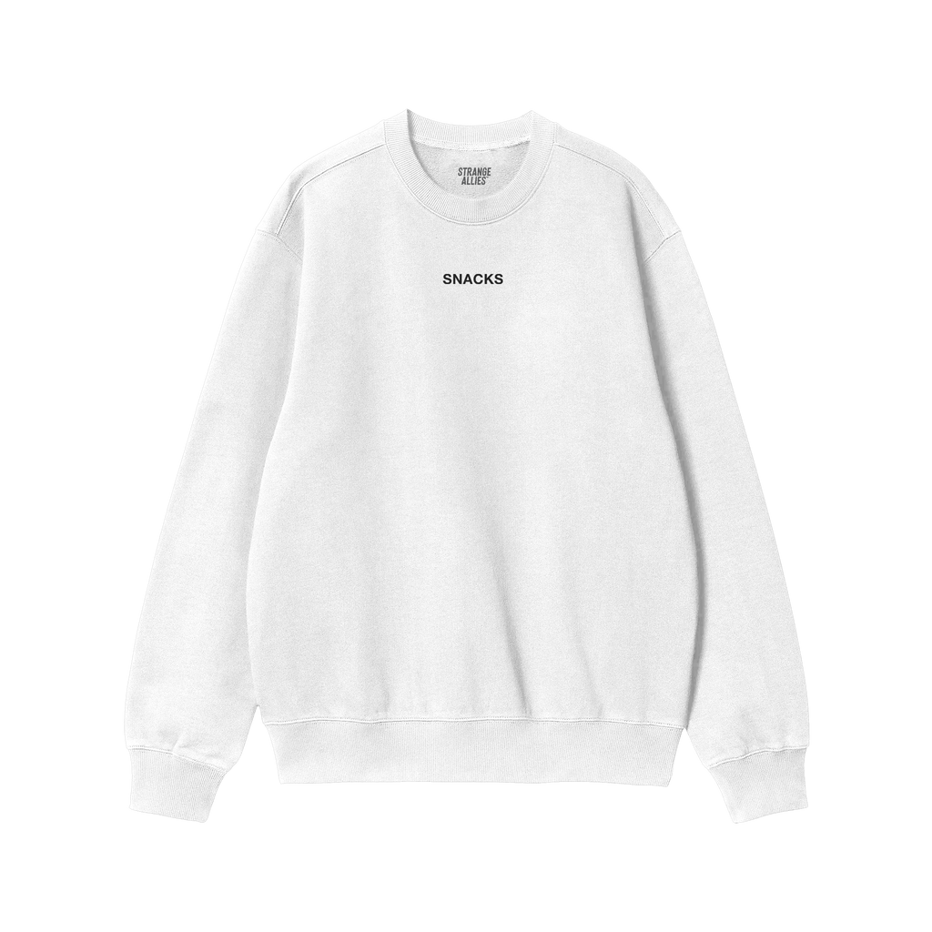 White crewneck sweatshirt featuring SNACKS in small black letters on the chest, embodying a minimal yet impactful style. Part