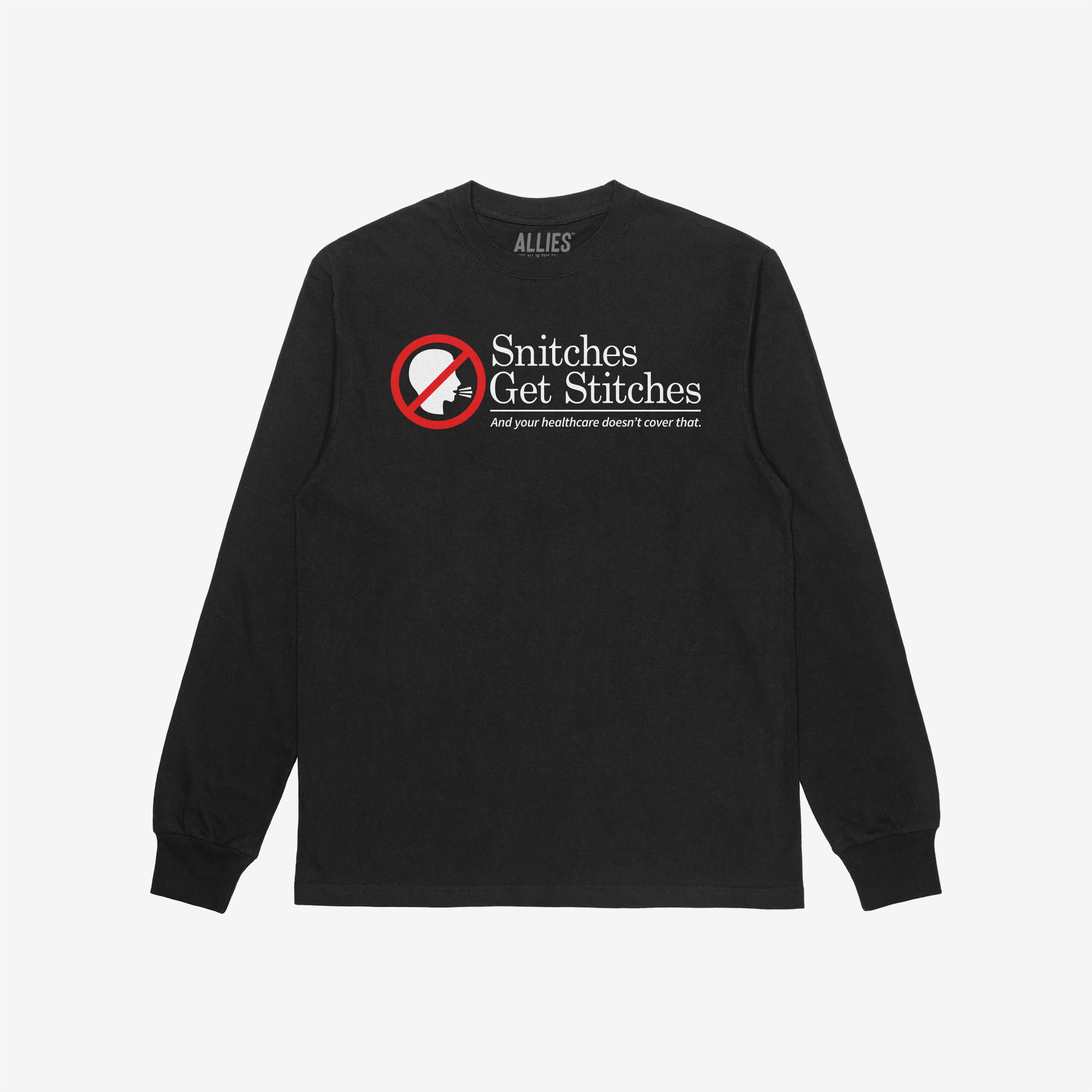 Black long-sleeve Snitches Get Stitches Shirt featuring a red no symbol over a face silhouette and the humorous slogan addressing loyalty and healthcare, embodying bold, unapologetic statements.