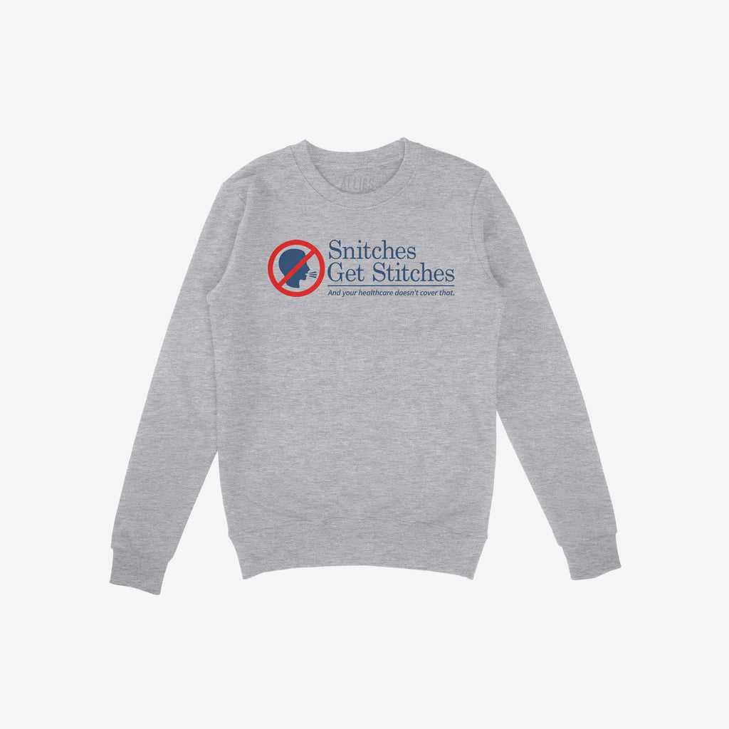 Snitches Get Stitches Shirt: Light-gray crewneck sweatshirt featuring a humorous graphic of a no symbol over a whispering profile, with the slogan critiquing healthcare coverage, perfect for sarcastic and loyal statement-making.