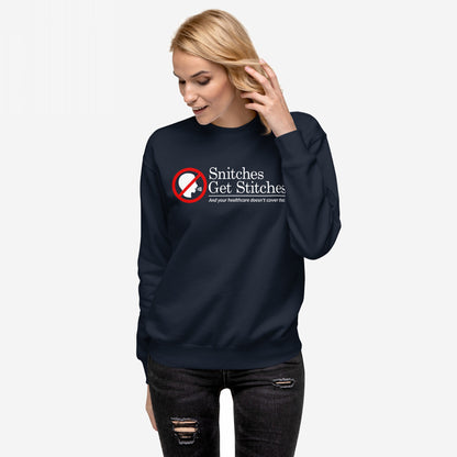 Young woman models the Snitches Get Stitches Hoodie & Sweatshirt, featuring a bold graphic and slogan critiquing snitches and healthcare. Perfect for those embracing sarcasm and dark humor.
