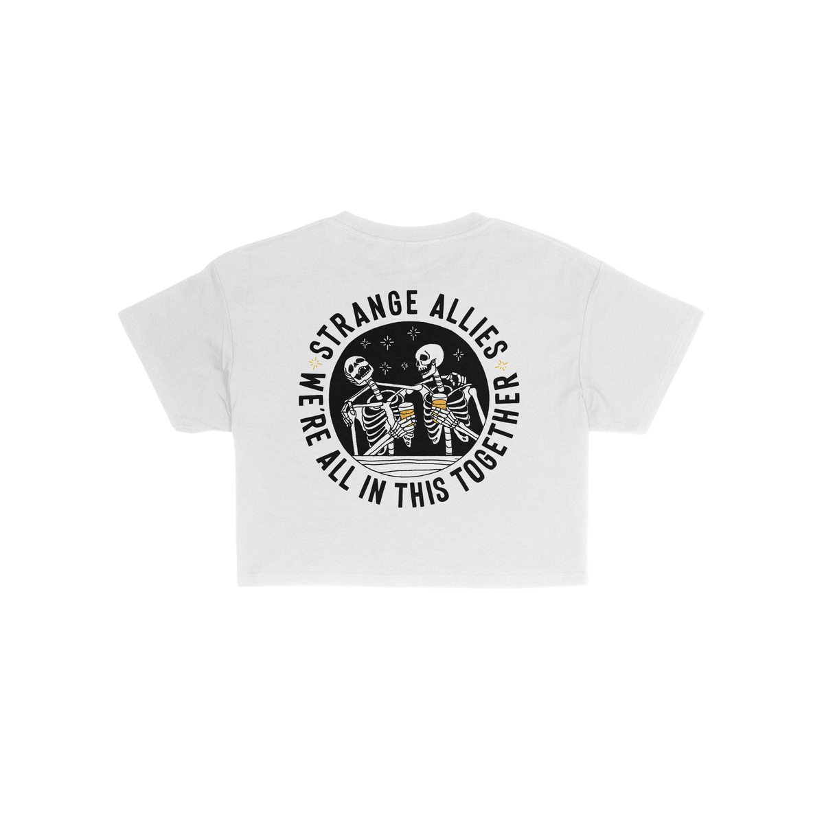Back view of the Social Club Women's Baby Tee featuring two skeletons toasting beer mugs with “STRANGE ALLIES” and “WE�