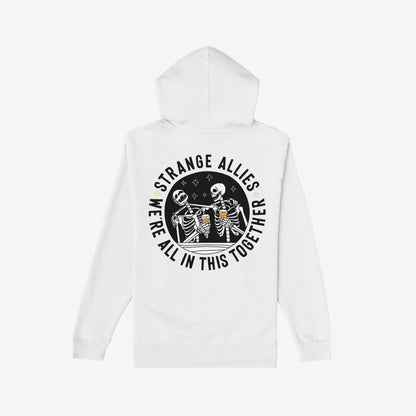 Social Club Hoodie & Sweatshirt featuring two skeletons toasting with beer mugs, surrounded by STRANGE ALLIES and WE'RE ALL IN THIS TOGETHER text on the back.
