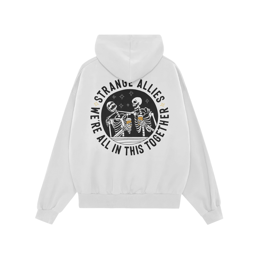Social Club Hoodie & Sweatshirt featuring two skeletons toasting with beer mugs, surrounded by STRANGE ALLIES and WE'RE ALL I