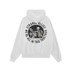 Social Club Hoodie & Sweatshirt featuring two skeletons toasting with beer mugs, surrounded by STRANGE ALLIES and WE'RE ALL I