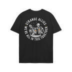 Social Club T-shirt features two cartoon skeletons clinking beer mugs, encircled by the slogan STRANGE ALLIES and WE’RE ALL