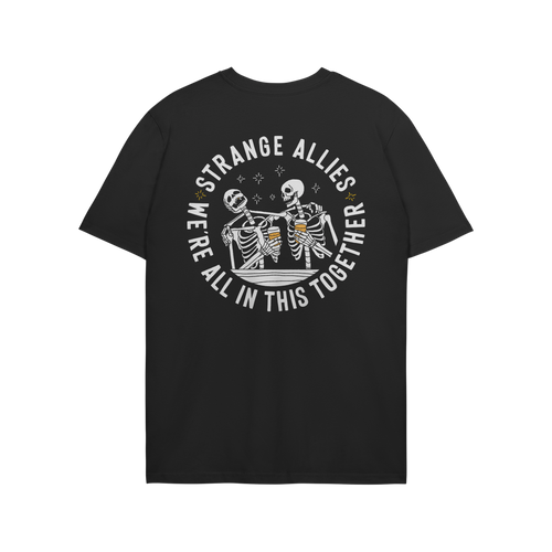Social Club T-shirt features two cartoon skeletons clinking beer mugs, encircled by the slogan STRANGE ALLIES and WE’RE ALL
