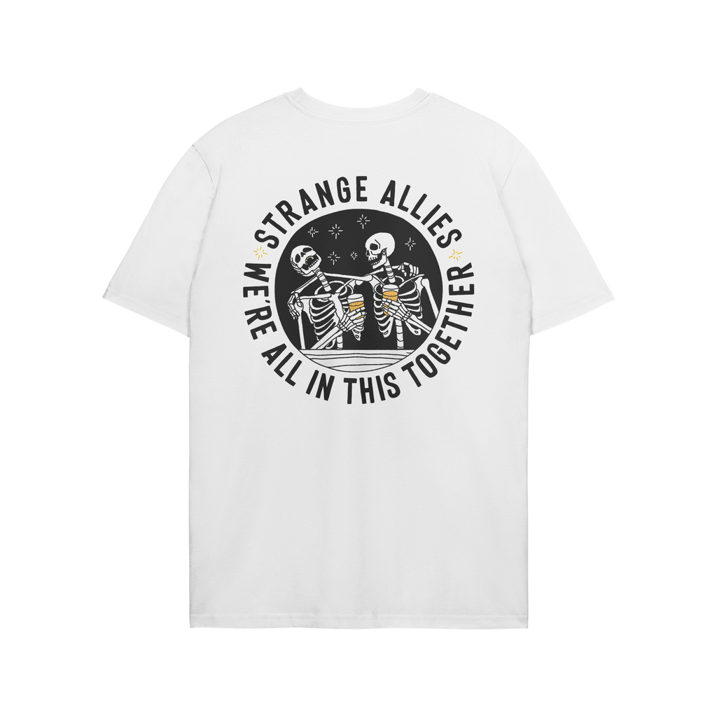Social Club T-shirt depicting two smiling skeletons with beer mugs under the text “WE’RE ALL IN THIS TOGETHER”, symboli