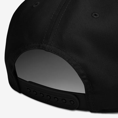 The Stop Teaching Hate Hat features an adjustable snap-back and detailed stitching, embodying a bold stand against bigotry with its impactful design, promoting equality and respect.