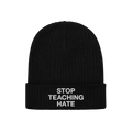 Black rib-knit beanie with STOP TEACHING HATE embroidered in white on the cuff, embodying a bold stance against hate.