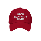 Red baseball-style cap with white embroidered text STOP TEACHING HATE, symbolizing a bold stance against hate. Ideal for thos