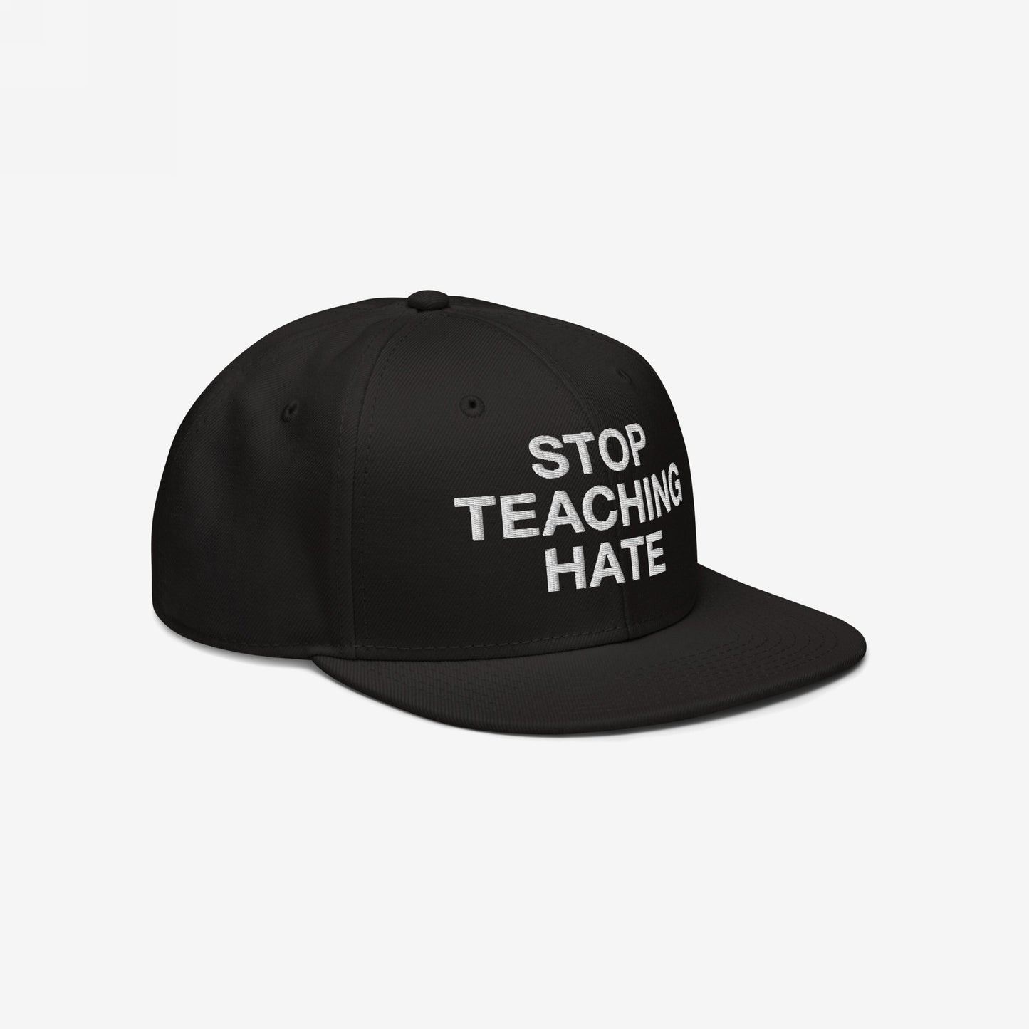 Black snapback cap with STOP TEACHING HATE embroidered in white, embodying a bold protest message for equality and justice. Ideal for expressing values at gatherings or daily wear.