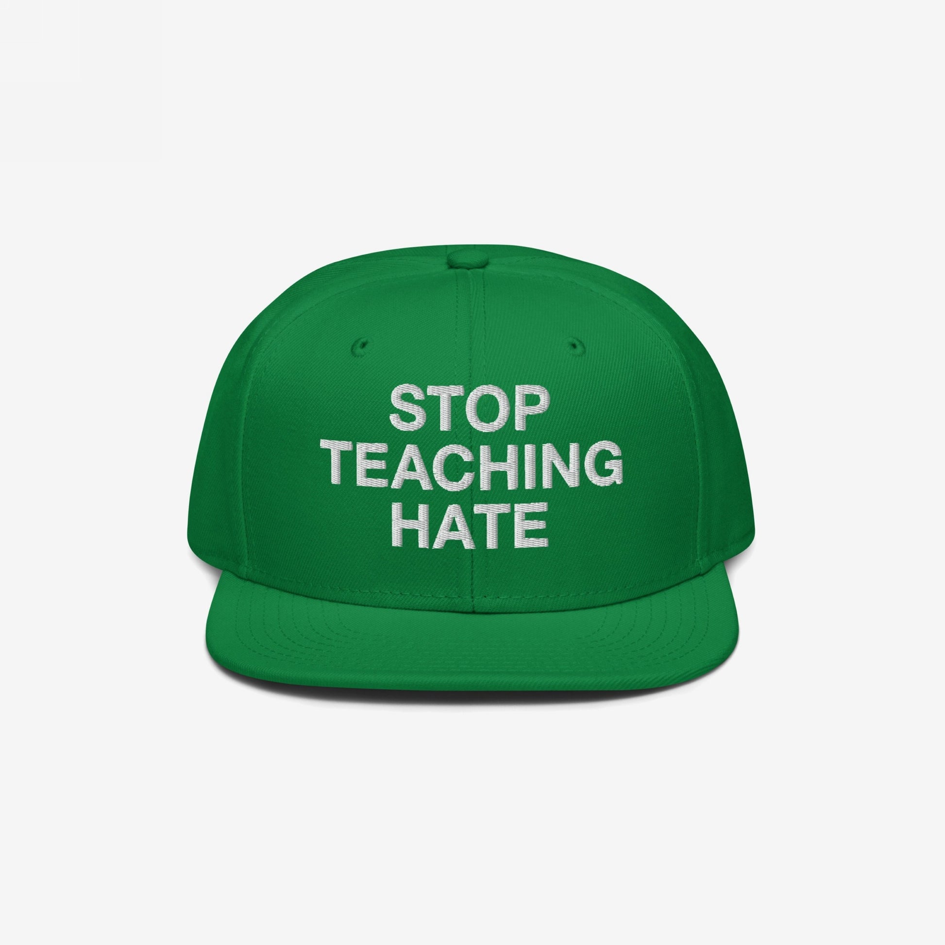 Green flat-brimmed baseball cap with STOP TEACHING HATE embroidered in white, symbolizing a bold stance against hate. Perfect for expressing values in everyday settings and activism.