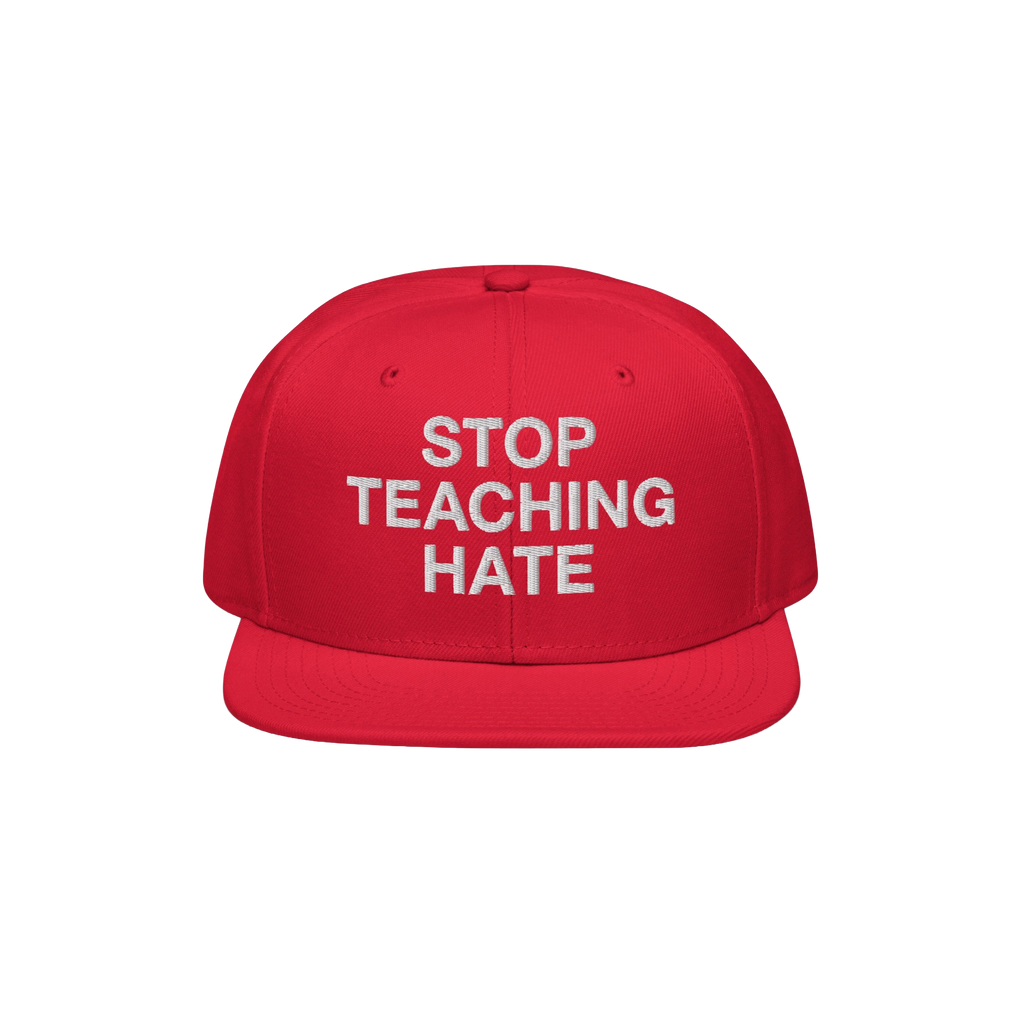 Red snap-back cap with STOP TEACHING HATE embroidered in white, embodying a bold stance against hate; designed for visibility