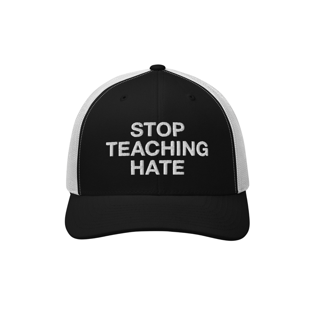 Black-and-white mesh-back baseball cap with STOP TEACHING HATE embroidered in white on the front panel, embodying a bold mess