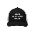 Black-and-white mesh-back baseball cap with STOP TEACHING HATE embroidered in white on the front panel, embodying a bold mess