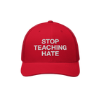 The Stop Teaching Hate Hat features bold white embroidery on a red trucker cap, conveying a clear message against hate. Ideal