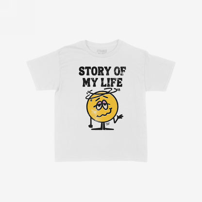 Story Of My Life T-shirt featuring bold, distressed lettering and a dizzy cartoon face with droopy eyes and swirly lines, capturing a humorous sense of comedic defeat and relatable chaos.