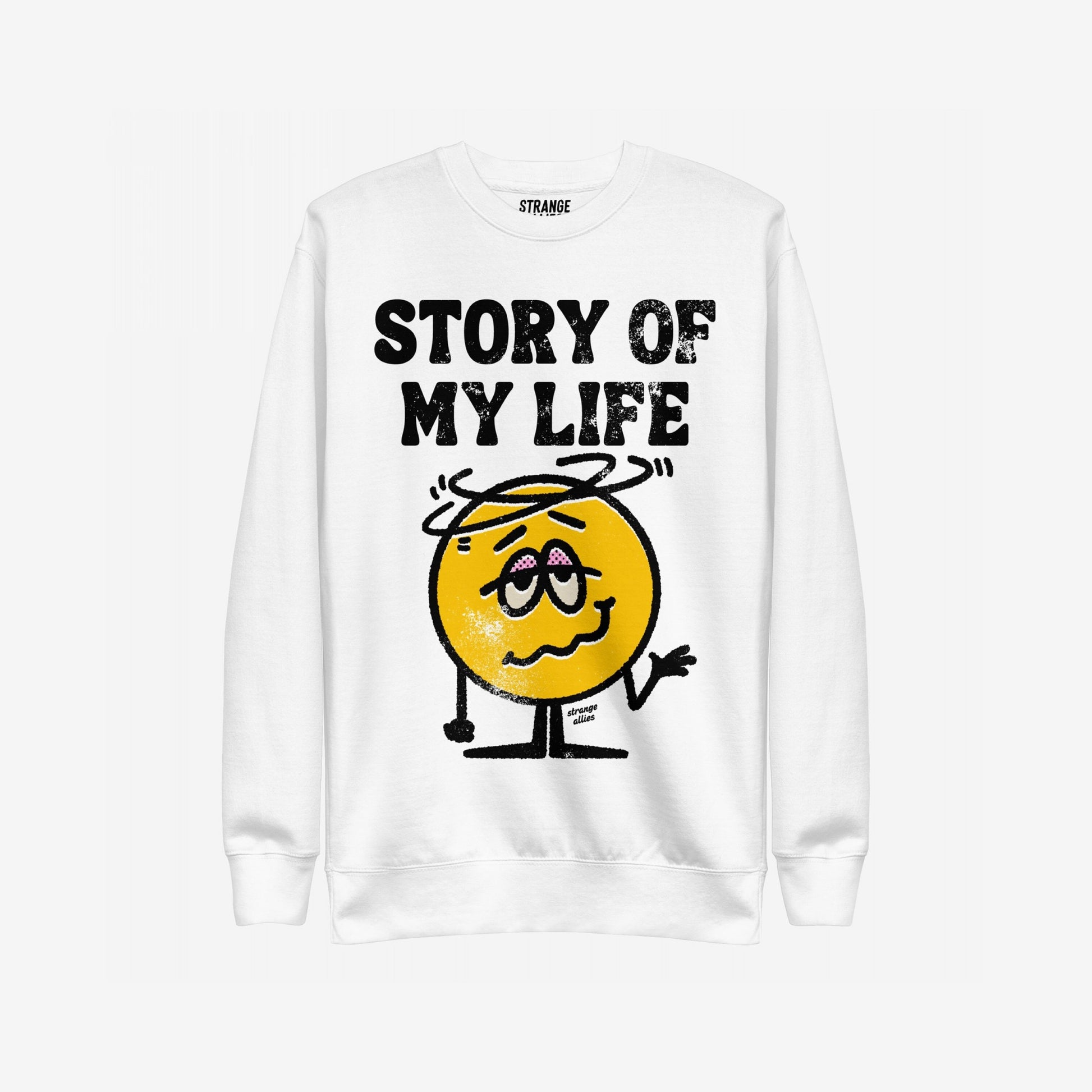 Story Of My Life Sweatshirt features a distressed print with a dizzy cartoon face under bold text, capturing a humorous take on life's struggles in a cozy, relatable design.