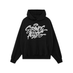 Strange Allies Handstyle Hoodie features a bold graffiti-style “STRANGE ALLIES” graphic with drips and halo, emphasizing 