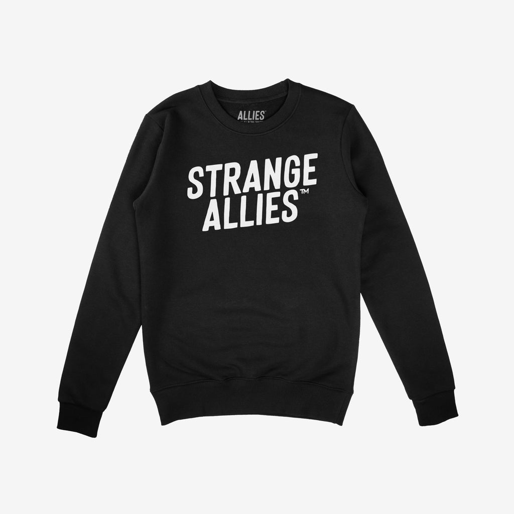 Strange Allies Hoodie & Sweatshirt features bold STRANGE ALLIES™ text on a black crew-neck, embodying unity and defiance. The “ALLIES” label at the back echoes the brand’s powerful message.