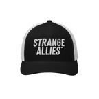 Strange Allies Hat featuring a black front with white mesh back, embroidered with “STRANGE ALLIES™.” A symbolic piece c