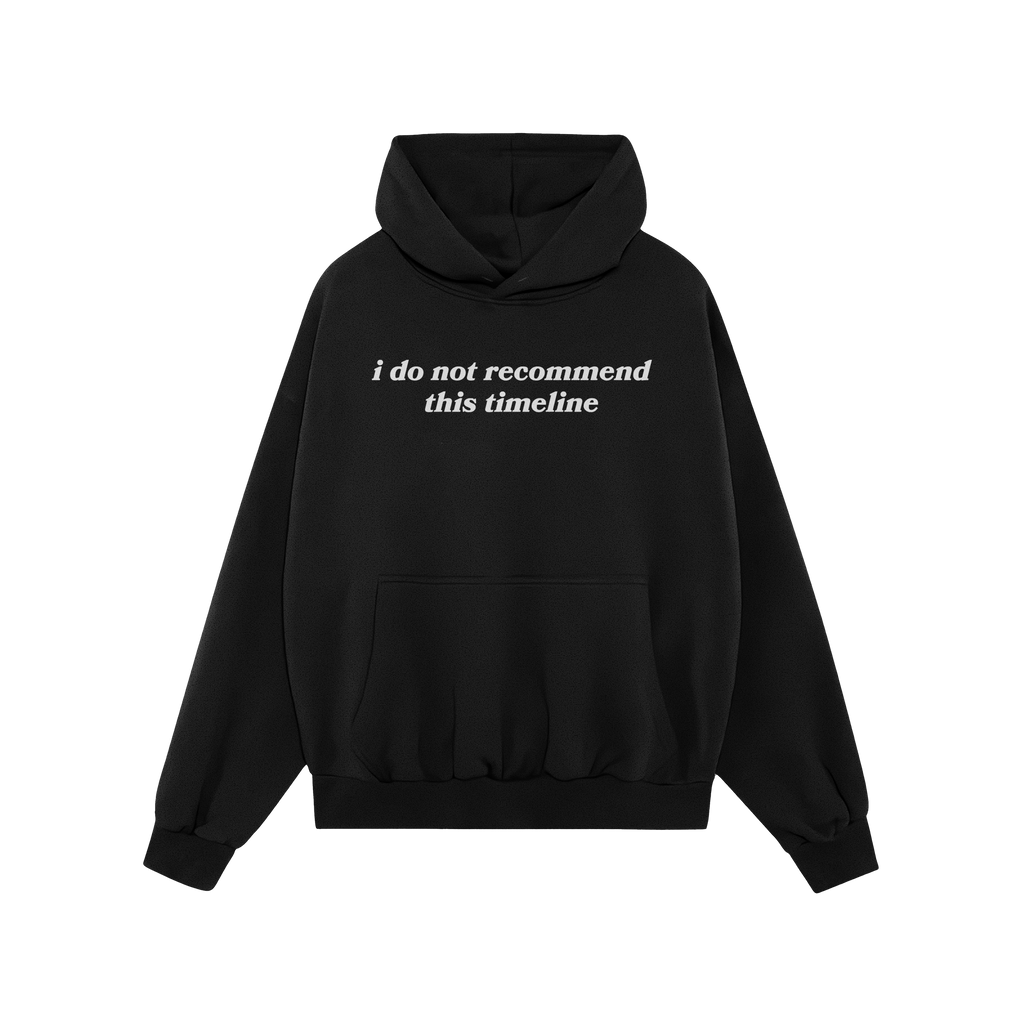 Black pullover Timeline Shirt with drawstring hood, kangaroo pocket, and ribbed cuffs, featuring “i do not recommend this t