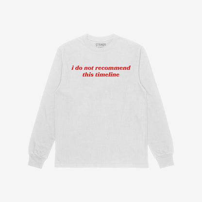 Timeline Shirt: A long-sleeve tee with bold red text, i do not recommend this timeline, capturing a humorous critique of modern life, perfect for skeptics and realists.