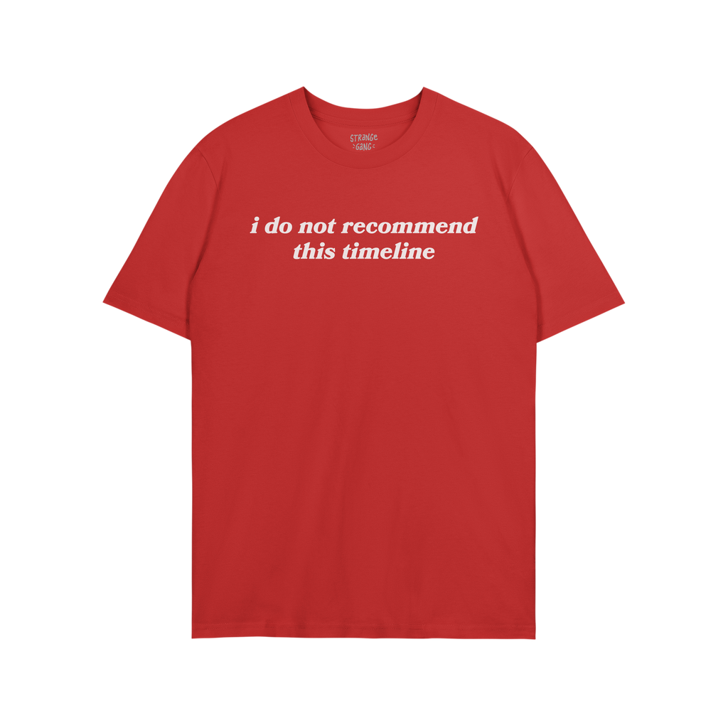 Red crew-neck Timeline Shirt with white text: “i do not recommend this timeline.” Features subtle humor and critique, ide