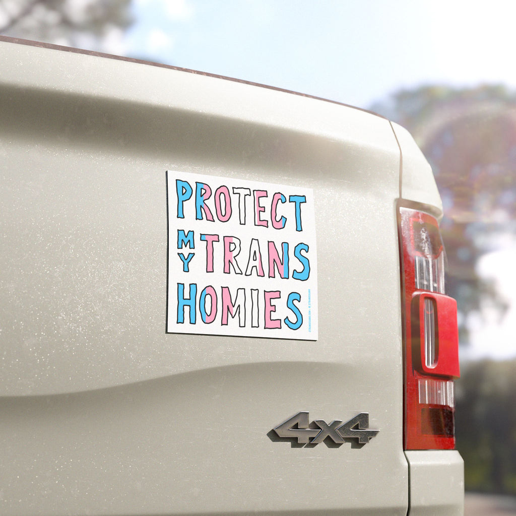 “Protect My Trans Homies” sticker on a 4x4 truck tailgate, showcasing trans pride colors. Durable and weatherproof, ideal for promoting trans rights visibility and support, made for allies and community members.