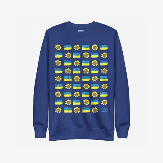Ukraine Sunflowers Sweatshirt: A royal-blue crewneck featuring a grid of stylized sunflowers and brush-stroke bars, symbolizing unity and resilience, with the designer’s tag in the corner.