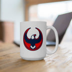 USA Rebel Alliance Mug on a wooden desk, featuring a bold eagle emblem in red, navy, and white. It's positioned before a laptop, symbolizing activism and patriotism in a home-office setting.