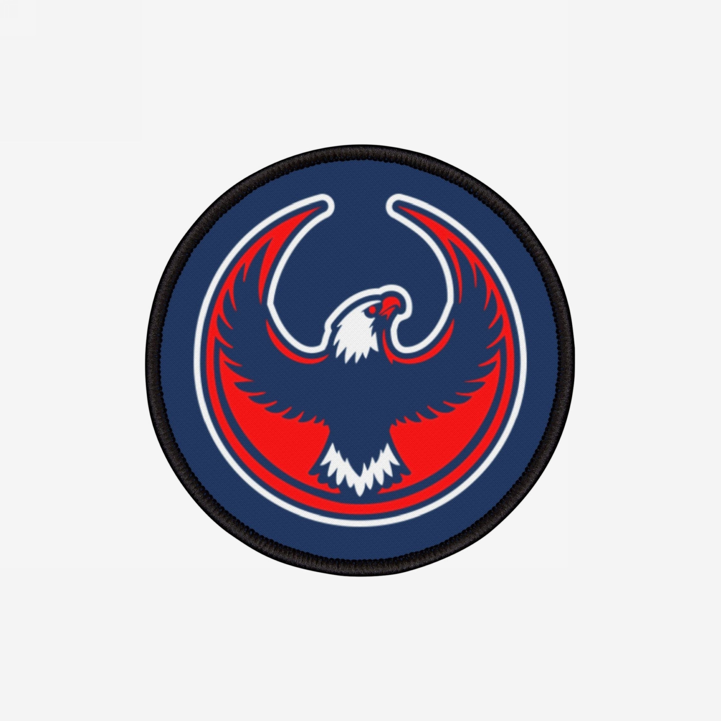 USA Rebel Alliance Patch featuring a stylized eagle with upward-swept wings, in a bold red and blue design. Ideal for anti-fascist and immigrant rights supporters, it conveys defiance and patriotism.
