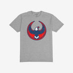 Heather-gray USA Rebel Alliance T-shirt featuring a distressed red and blue circular emblem with a stylized eagle, symbolizing resistance and equality. Ideal for protest readiness and supporting community values.