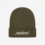 Rib-knit olive-green Useless Hat with white embroidery on the cuff, featuring yellow starburst motifs. This beanie embodies a relaxed vibe, encouraging rest and mindfulness over relentless productivity.