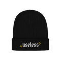 Black rib-knit beanie, labeled Useless in white Old English letters, flanked by yellow starbursts; embodies relaxation and re