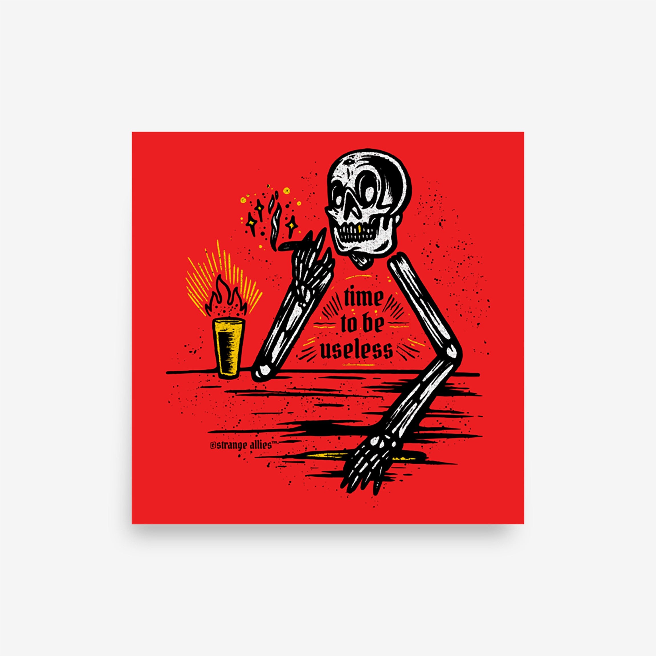 The Useless Giclée Print features a skeleton with a cigarette and drink, leaning on a counter. The phrase “time to be useless” is displayed, capturing an irreverent and bold artistic style.