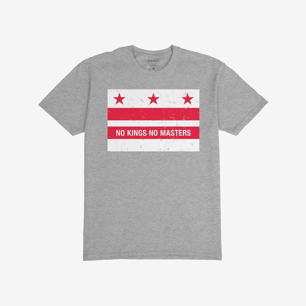 Light gray Washington DC No Kings Flag Shirt with a distressed-red-and-white graphic featuring three stars, two stripes, and NO KINGS NO MASTERS, symbolizing resistance and anti-authoritarianism.