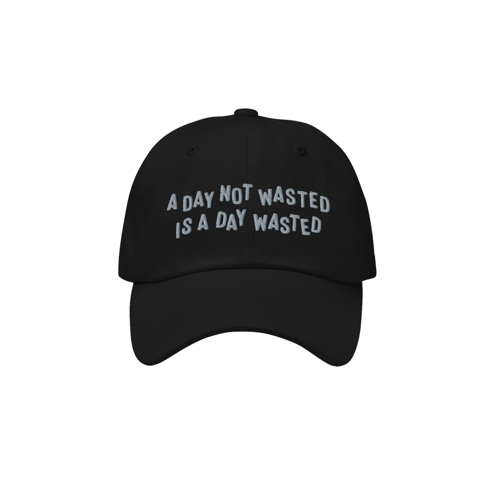Wasted Days Hat featuring bold embroidery with the phrase “A DAY NOT WASTED IS A DAY WASTED” on a black cap, embodying a 